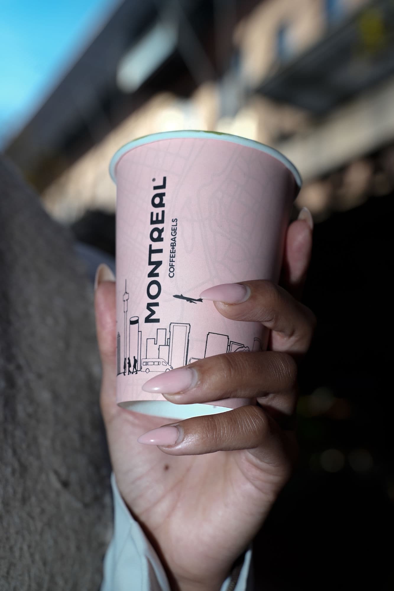 Elegant Coffee green cans — street photography Johannesburg